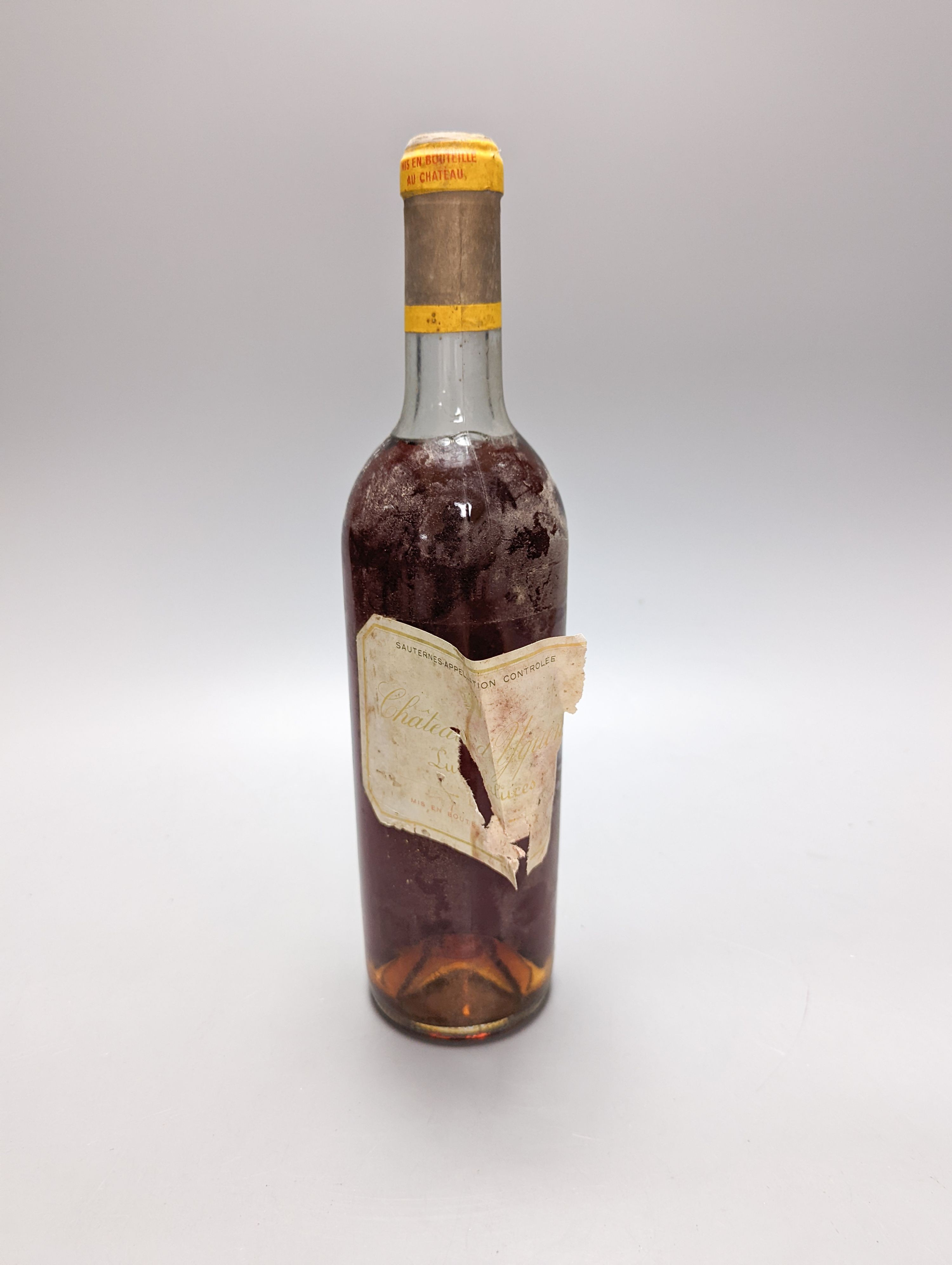 Two bottles of Chateau D'Yquem Sauternes 1967-1965, and a 375ml bottle